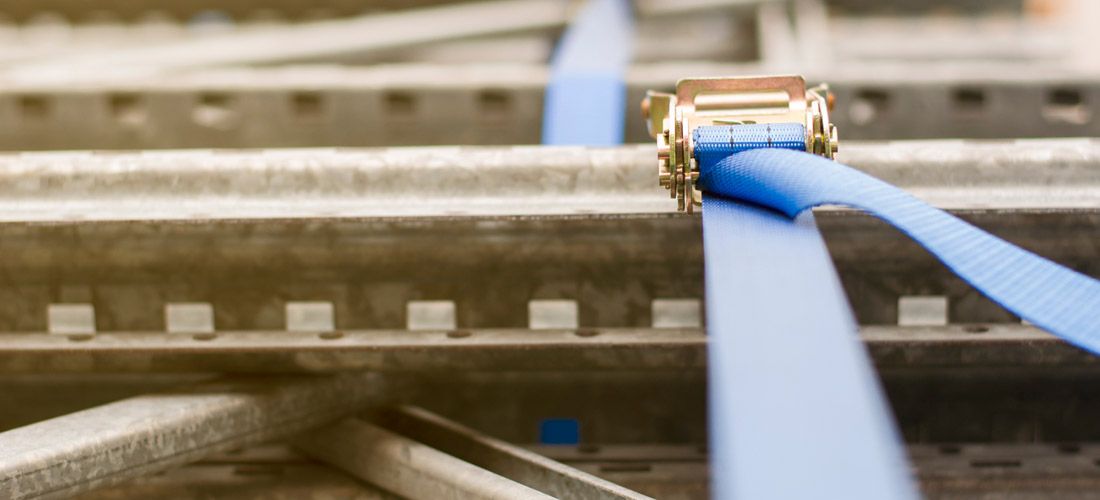 blue bundling straps wrapping around welded metal parts